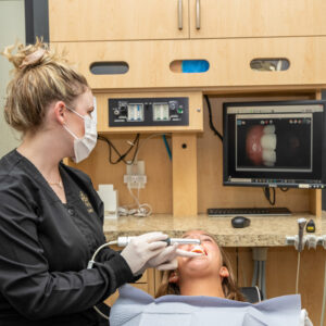 dentist working on patients teeth